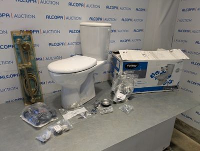 a white toilet sitting on top of a counter next to a box of toilet paper