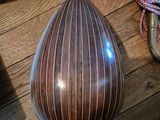 a vase that is sitting on a wooden table