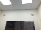 a picture of a room with a mirror and a door