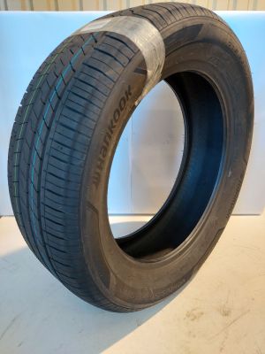 a close up of a tire on a white surface