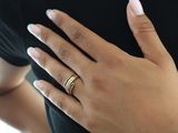 a woman with a ring on her left hand and a ring on her right hand