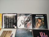 a lot of cds and cds on a table