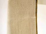 an image of a burlock bag hanging on a clothes rack
