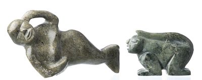 deux figurines représentant un ours et un ours sur un fond blanc
