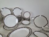 a lot of plates that are sitting on a table