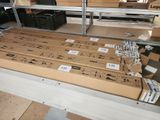 many boxes that are sitting on a shelf in a room