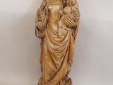 statue of a woman holding a child in her arms