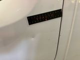 a sticker that says vatato on the side of a white car