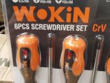 three screwdrivers in the package on the shelf