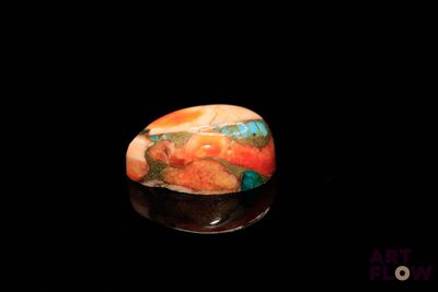 a close up of a stone with a black background