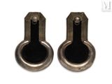 pair of antique brass door handles on a white background