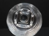 a close up view of a glass of water on a table