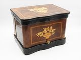 an image of a wooden box with a floral design on it
