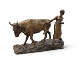 statue représentant une femme tirant un taureau, tandis qu'un homme est assis sur une charrue