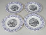 quatre assiettes bleues et blanches sur lesquelles figurent un homme et une femme