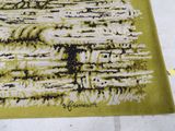 a rug that has a picture of a tree on it