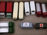 many different types of toy trucks in a box