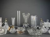 a lot of glass items that are on a table