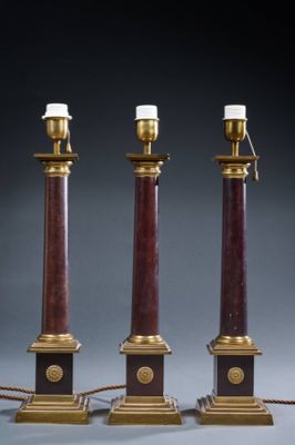 pair of antique brass and red marble lamps on stands