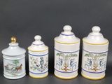 three different types of ceramic containers with designs on them