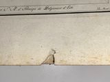 a piece of paper with writing on it on a table