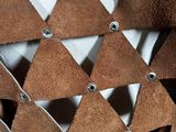 a close up of a piece of cloth with holes in it