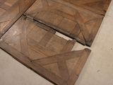 four pieces of wood that are laying on the floor