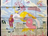 a scarf with a picture of a woman flying a kite in the sky