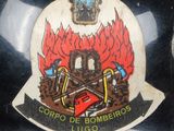 a badge on the back of a motorcycle with a castle on it