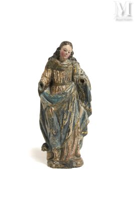 an image of a statue of a woman in a blue dress