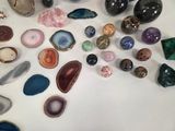 a lot of different types of stones on the table
