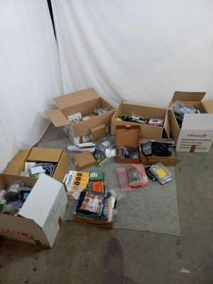 a lot of boxes and other items that are on the floor