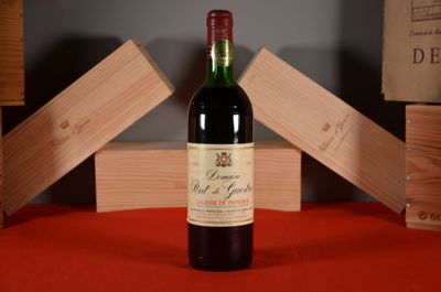 a bottle of wine that is sitting on a table