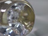 a close up view of a light bulb on a table