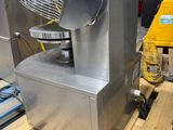 a machine that is sitting on a pallet in a warehouse