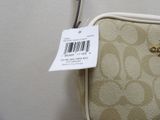 a purse with a price tag on it sitting on a table