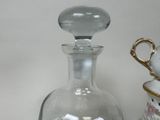 two vases that are next to each other on a table