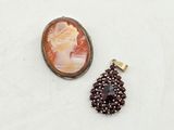 an image of a picture of a woman and a pendant on a white surface