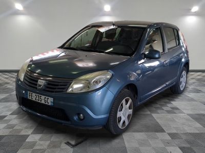 a picture of a small blue car parked in a garage