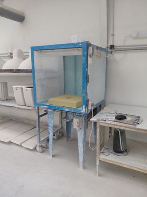 a room that has a table and a chair in it