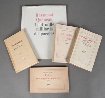 four books are sitting on a table next to a bag