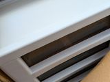 a cardboard box with a ventilator inside of it