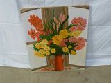 une image d'un tableau de fleurs dans un vase sur une table