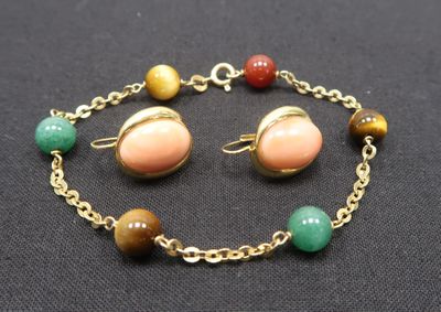 an image of a bracelet and earring set with multi colored beads