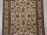 a rug with a floral design on a white ground