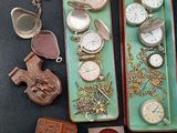 many different types of watches on display on the table