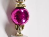 three christmas ornaments stacked on top of each other