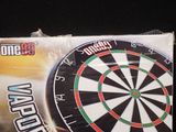 a picture of a dart board in the box