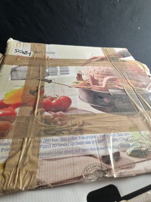 a stack of magazines sitting on top of a table