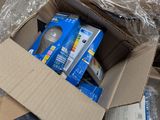a cardboard box full of items that are in a room